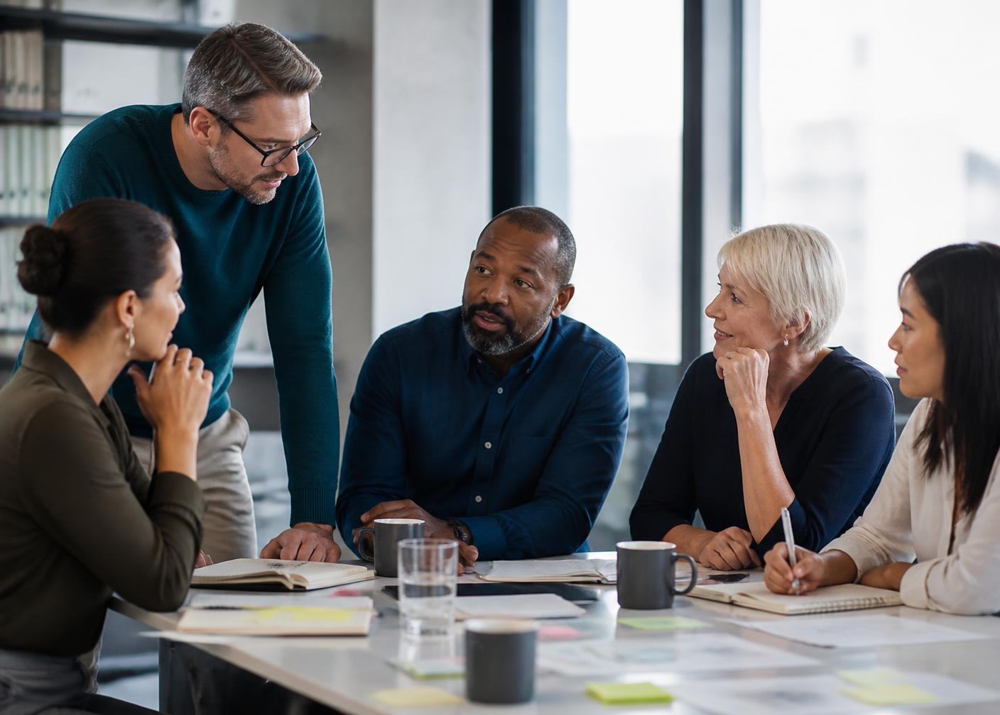 An executive team collaborating during a leadership workshop